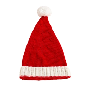 Close-up of red and white knitted Christmas hat with soft pompom for winter warmth
