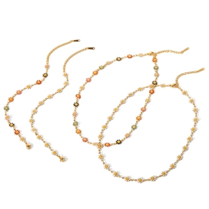 Collares de acero de titanio bañados en oro 18K con margaritas de esmalte de colores