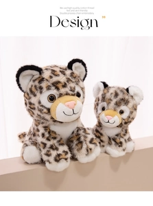 Macro detail of plush leopard toy set with soft faux fur and delicate embroidered eyes
