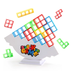 Colorful balancing stacking game with curved base and transparent puzzle blocks