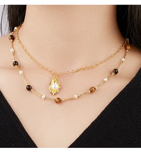 Double-layer gold necklace with oyster shell pendant, white pearls and brown tiger eye beads