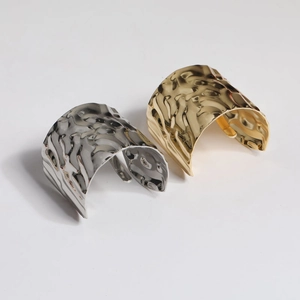 Metallic pony hooks with hammered texture in gold and silver finish for sleek hair styling