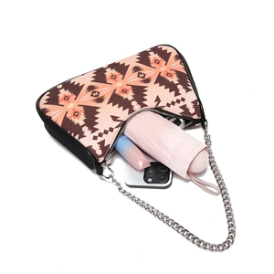 Top view of Aztec print shoulder bag interior showing capacity for phone and umbrella