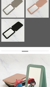 Macro detail of portable folding makeup mirrors with colorful PU leather textured covers