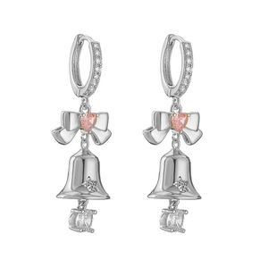 Detail of silver bow bell earrings featuring pink heart stones and sparkling star charms