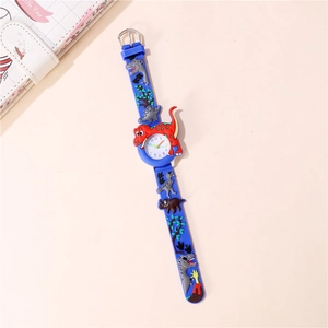 Detail of 3D dinosaur patterns on a blue silicone strap for a children's watch