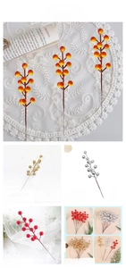Detailed close-up of decorative artificial Christmas berries for home floral arrangements