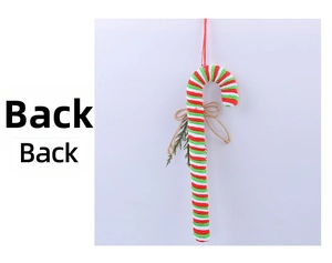 Macro detail of hand-knitted Christmas candy cane ornament with red and white spiral patterns