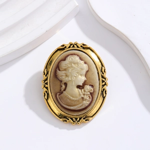 Retro European style gold metal oval brooch with elegant female silhouette cameo