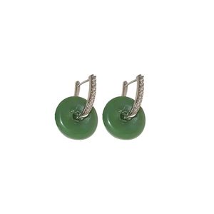 Minimalist jade donut earrings with silver cubic zirconia pavé hook on white background