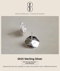 Macro shot of S925 sterling silver hallmark on geometric double lotus pearl earrings