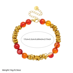 Bracelet chaîne en acier doré avec perles d'agate rouge-orangé et entretoises à ressort