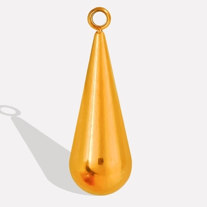 Detailed close-up of a polished gold-plated teardrop pendant with top metal loop for DIY jewelry