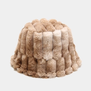 Detailed close-up of khaki faux fur bucket hat with vertical stripe texture for winter