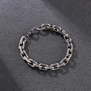 Detailed view of vintage silver steel chain bracelet with a sturdy lobster clasp