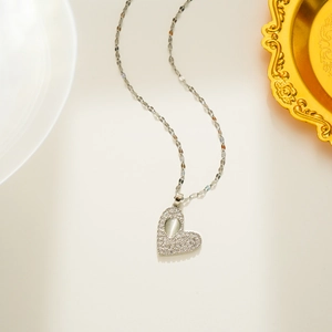 Micro-paved opal heart necklace in titanium steel with shimmering silver finish