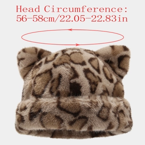Detail view of leopard print plush hat with fox ears and head size 56-58cm info