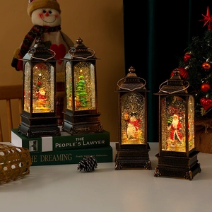Retro Christmas lantern collection with glowing snow globe effect and Santa figurines