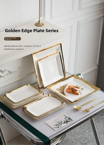 Detailed view of luxury ceramic plates with hand-painted gold rims and deepening capacity