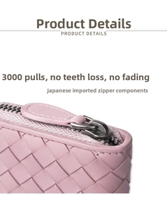 Detail of pink woven leather wallet featuring a premium Japanese imported metal zipper