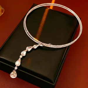 Sparkling double-layer teardrop pendant necklace with zircon stones on a jewelry display