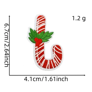 Detail of candy cane embroidery patch with size markers and holly leaf decoration