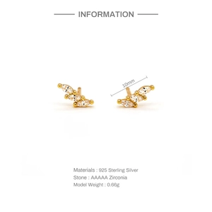 Detailed view of gold S925 sterling silver leaf stud earrings with AAAAA cubic zirconia