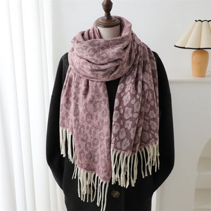 Fashionable leopard print jacquard scarf with tassels in soft pink and purple tones
