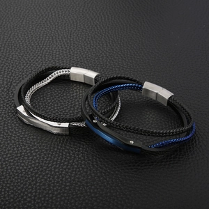Close-up of multilayer leather bracelets with silver and blue magnetic stainless steel clasps