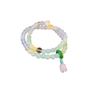 Double-layered beaded bracelet with green jade ring and pink flower bell charm