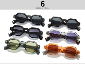 Flat lay of retro geometric narrow frame sunglasses in six vibrant trendy colors