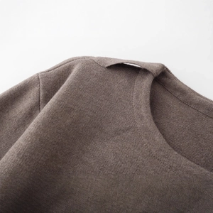 Brown French-style knitted short coat with elegant scarf and fine knit texture