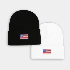 Set of black and white knitted beanies with American flag embroidery for outdoor style