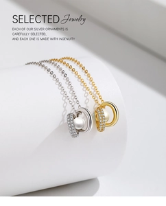 Detailed macro view of S925 silver and gold necklaces with freshwater pearls and zircons