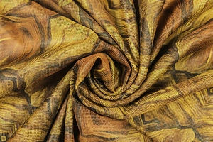 Macro detail of breathable mesh fabric with artistic yellow and brown floral print