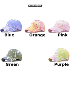 Detailed view of colorful tie-dye baseball caps with shimmering rhinestone decorations