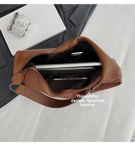 Braune Leder-Einkaufstasche mit Laptopfach und Platz für den täglichen Bürobedarf