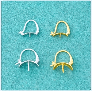 Macro shot of gold and silver S925 sterling silver earring clips for pearl jewelry making