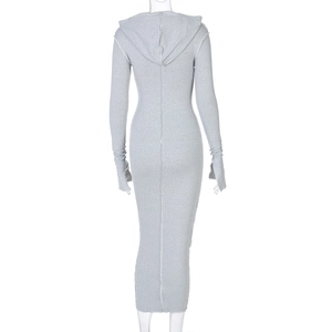Detail of grey hooded maxi dress featuring ribbed fabric texture and thumbhole cuffs