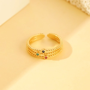 Three-layer gold open ring featuring green, blue, and pink cubic zirconia stones