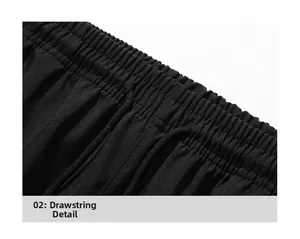 Detail of high-elastic waist with drawstring on black quick-dry sport trousers