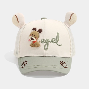 Detail of mesh baseball cap with cartoon dog patch and 3D ears for toddlers