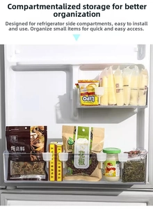 Detail of clear clip-on organizer bins on a refrigerator side shelf for storage