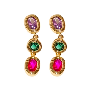 Elegant gold drop earrings with tiered oval purple, green, and rose red crystals