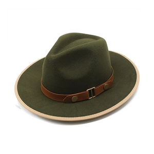 Detail of dark green wool fedora with brown leather band and metallic buckle accent