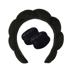 Three-piece black microfiber spa set featuring a padded sponge headband and wristbands