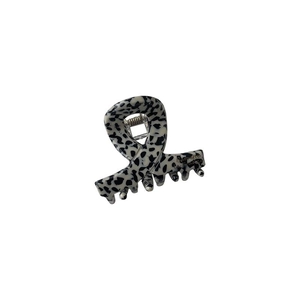 Elegant black and white leopard pattern hair claw clip with a chic twisted design