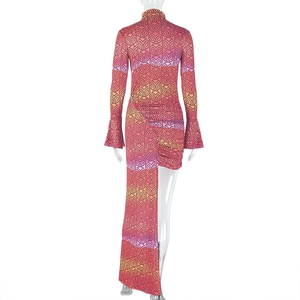 Rear view of long sleeve asymmetric dress with colorful geometric patterns and high neck