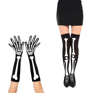 Close-up of Halloween costume set with white skeleton printed gloves and long socks