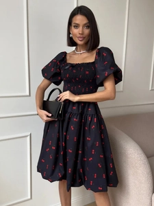 Square neck puff sleeve dress with red cherry print and smocked bodice detail